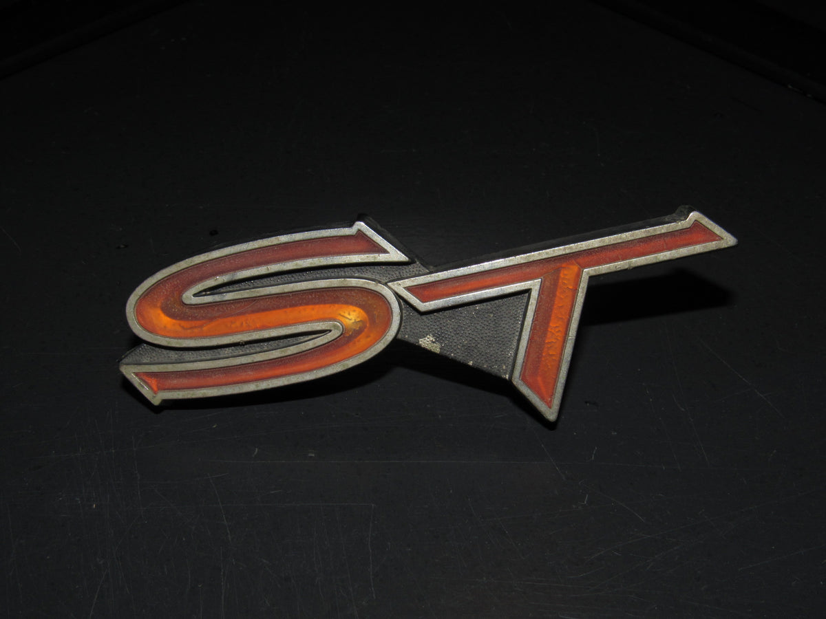 76 77 Toyota Celica OEM Front Grille ST Emblem Badge – Autopart3