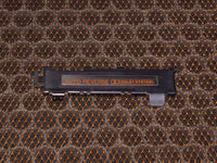 86-88 Mazda RX7 OEM Radio Cassette Player Flapper Door