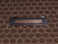86-88 Mazda RX7 OEM Radio Cassette Player Flapper Door