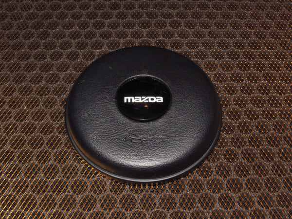 79-83 Mazda RX7 OEM Steering Wheel Horn Pad Cover