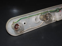 73 74 Toyota Celica ST Coupe OEM Tail Light Bulb Socket Panel - Left