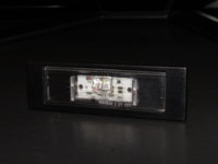 20 21 22 23 24 Toyota Supra OEM Rear License Plate Light Lamp