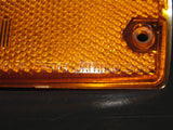 76 77 Toyota Celica OEM Front Side Marker Light Lamp Lens & Bezel - Left