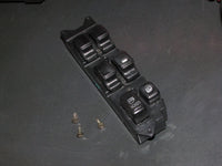 00-05 Mitsubishi Eclipse Spyder OEM Window Switch - Left