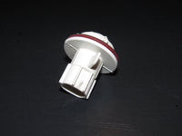 00 01 02 03 04 05 Mitsubishi Eclipse OEM Reverse Light Bulb Socket - Left