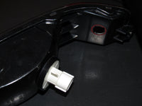 00 01 02 03 04 05 Mitsubishi Eclipse OEM Reverse Light Bulb Socket - Left