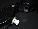 00 01 02 03 04 05 Mitsubishi Eclipse OEM Reverse Light Bulb Socket - Left