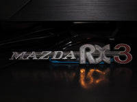 72-78 Mazda RX3 OEM Rear Quarter Panel Emblem Badge